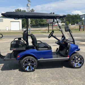 "User-friendly dashboard of the 2025 Evolution Classic 4 Plus Lithium LSV, showcasing modern controls and displays."